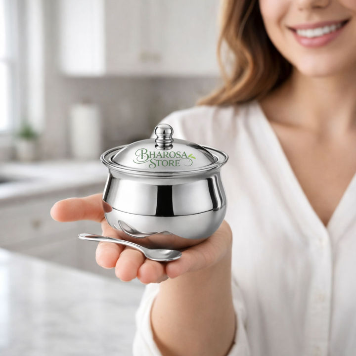 Premium%20Mirror%20Finish%20Stainless%20Steel%20Ghee%20Pot%20With%20Lid%20And%20Spoon%20%E2%80%93%20Multipurpose%20Storage%20Container%20For%20Ghee,%20Oil,%20Pickle,%20Sugar%20And%20Kitchen%20Essentials%20-%20Image%204