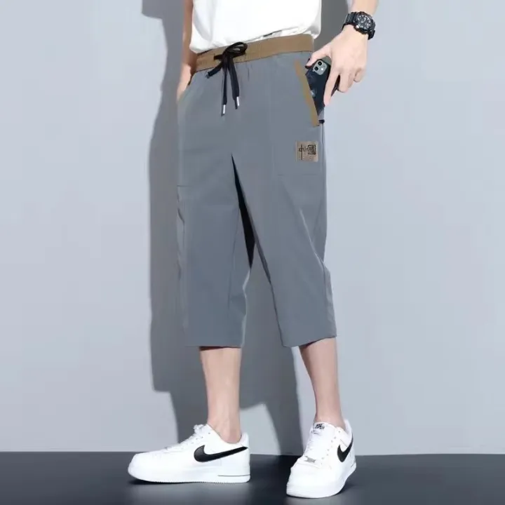 Douyin%20cropped%20slacks,%20men's%20elastic%20waist,%20loose%20shorts,%20trendy%20embroidered%20Chinese%20ice%20silk%20quick-drying%20sports%20pants%20-%20Image%203