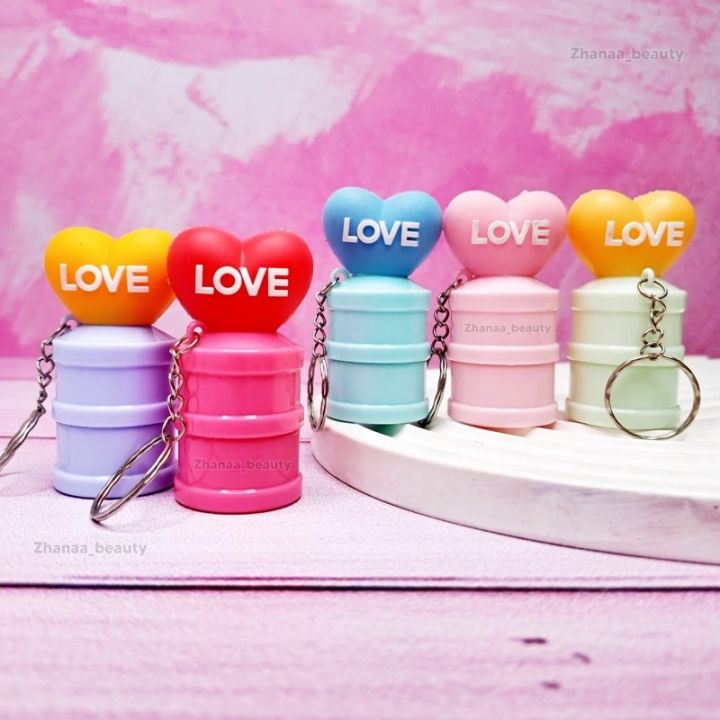 Cutie%20Lip%20Balm%20with%20Keychain%20%7C%204%20Designs%20%7C%20Moisturizing,%20Nourishing,%20Glossy%20%7C%20For%20Soft,%20Shiny%20Lips%20%7C%20Portable%20Lip%20Care%20-%20Image%202