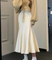 2023 autumn and winter new mermaid skirt small design sense thin and slender high-waisted knitted hip skirt women. 
