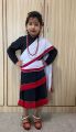Girl  Newari Traditional Saree Set Bhoto And Readymade Saree Patuki With Red Boarder Muga Red Mala Silver Plated Jyapu Shikhaa Sachika For Hair Bond  Gold Plated Ear Ring  Makasi  Gold Plated Nyapu Shikhaa  Silver Plated Kale. 