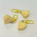 Mini size Cheese keychain Unique Resin Student girl Jewelry pendant Durable material Sweet Imitation food play pendant for Backpack decoration. 