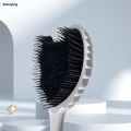 Sutuiying 1pc Angel Wings hair comb, durable plastic bristles, ABS handle, 2025 suitable for wet or dry use, small portable styling tool. 