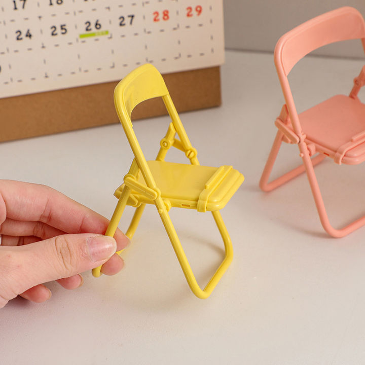 Mini%20Chair%20Shape%20Mobile%20Phone%20Stand%20Portable%20Cute%20Colorful%20Adjustable%20Folding%20Stool%20Lazy%20Phone%20Desktop%20Holder%20For%20Cell%20Phone%20Queena%20-%20Image%205