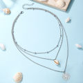 【Good sharing!】Bohemian Style Shell Hollow Round Bead Combination Multi-layer Necklace Hollow Round Carved Three-layer Necklace Female. 