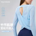 New slub yarn loose breathable luxury yoga wear top long sleeve hollow beauty back slim yoga blouse women. 