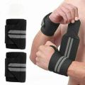 Wrist Support Band for Men and Women - Wrist Wraps with Thumb Loop for Weightlifting, Powerlifting, Gym, and Crossfit.. 