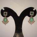 Diamond Earing with Emerald. 