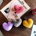 Fur ball key chain love car pom leopard print hair new heart shaped fluff ball keychain ladies bag pendant key ring jewelry. 