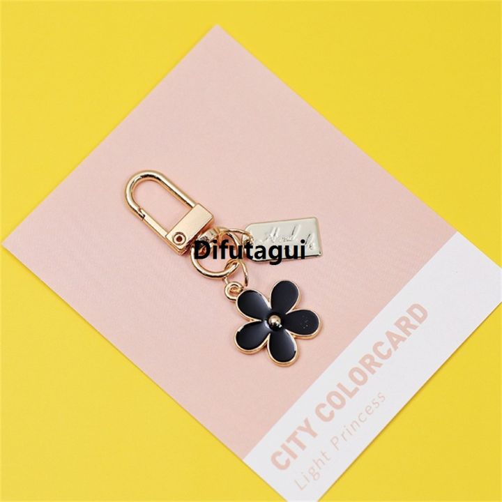Difutagui%20Cute%20Mini%20Daisy%20Keychain%20for%20Women%20Handbag%20Trinkets%20Bluetooth%20New%20style%20Headset%20Pendant%20Key%20Ring%20DIY%20Friendship%20Gifts%20-%20Image%205