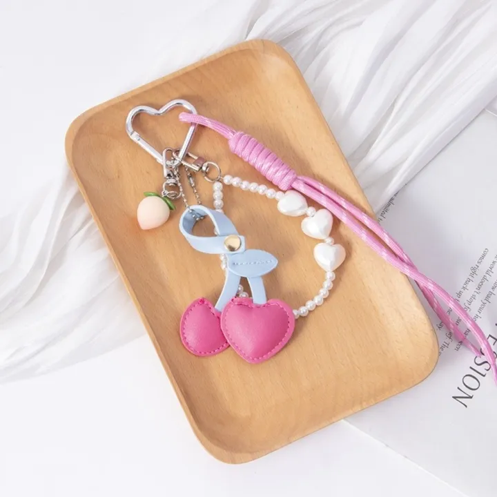 Rope%20Design%20Red%20And%20Black%20Leather%20Rope%20Keychain%20Leather%20Material%20Charm%20Pendant%20Ribbon%20Bag%20Charm%20Weaving%20Style%20Cherry%20Pendant%20Trendy%20Jewelry%20-%20Image%203