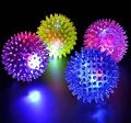 LED Flashing Bouncing Spiky Ball Squeezy Toys by Crown Aquatics. 