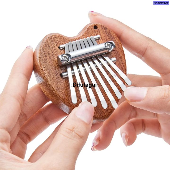 Difutagui%20Mini%20Kalimba%208%20Key%20Thumb%20Piano%201%20Pack%20Water%20Drop%20StylSpecial%20Fifty%20percent%20discount%20e%20Cute%20Instrument%20Portable%20Exquisite%20Gift%20Set%20for%20Kids%20-%20Image%209