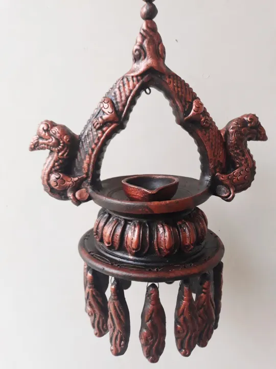 Hanging%20Paanas/Panas/Kha%20Dalo/%20Diyo%20Holder(Home%20Decor/%20Interiors/%20Exterior/%20Traditional/Ritual)%20-%20Ceramic%20-2ft(length)%20by%2010inch(diameter)%20-%20Image%203