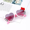 JIJIN fashion cartoon ultraviolet rays Kawaii heart shape HelloKitty sunglasses Sanrio cute ribbon glasses girl protection sunglasses kids toy gift. 
