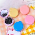 Foldable Pretty Small Round Comb Mini Makeup Mirror Multifunctional Hair Care Air Cushion Brushes Scalp Massage Styling Tools. 