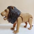 Battery operated Walking and Roaring Lion. 