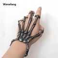 Wenefang 1Pcs New Unique Punk Skeleton Hand Bone Versatile Five Finger Ring New style Personality Adjustable Anillo Hombre Bracelet Party Jewelry. 