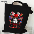 Sutuiying Hip Hop Radio Bunny Tote Bag Women Men Harajuku Fashion Rabbit Shopper Hot Selling Eco Canvas Shopping Bag Cartoon Punk Bunny Teen Handbags. 
