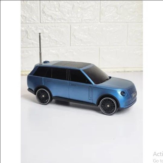 Kisonli%20B3%20Car%20Design%20Wireless%20Bluetooth%20Speaker%20with%20Solar%20Charging%20%7C%2010W%20Output%20%7C%20Portable%20Mini%20Speaker%20%7C%20FM,%20TF%20&%20USB%20Support%20-%20Image%204