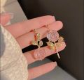 Pink Crystal Rose Asymmetric Drop Earrings. 