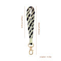 construction Wristband keychain Handcrafted Microfiber material Woven design Hand woven key charms Leather details Plaid. 