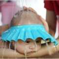 Adjustable Baby Bath Hat/Shower Cap -Assorted Color. 