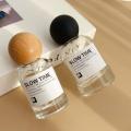 High-End Perfume Bottle Elegant Design 30ml 50ml Glass Spray Bottle Large Capacity Wooden Cap Replacement Bottle for. 