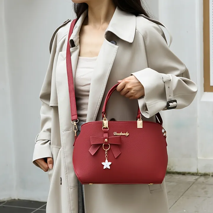 For%20everyday%20and%20party%20work,%20the%20handbag%20is%20stylish%20with%20multiple%20straps,%20an%20elegant%20shoulder%20bag%20with%20bow%20trims,%20compartments,%20fit,%20use%20-%20Image%206