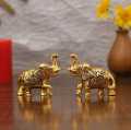 Handicrafts Set of Two Piece Metal Sculptures Elephant Pair for Showpiece and Decoration | Elephant Statue Pair in Golden Finish Having Attractive Look Decorative Showpiece - 6.25 cm  (Brass, Gold). 