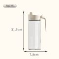 New Transparent Oil Tank 500ML Large Capacity Glass Oil Dispenser Household Curved Handle Oil Bottle Restaurant. 