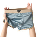 Huajie Long men's underwear ice silk new solid color pull-out mid-rise men's plus-size breathable men's boxers can be sent on behalf of others. 