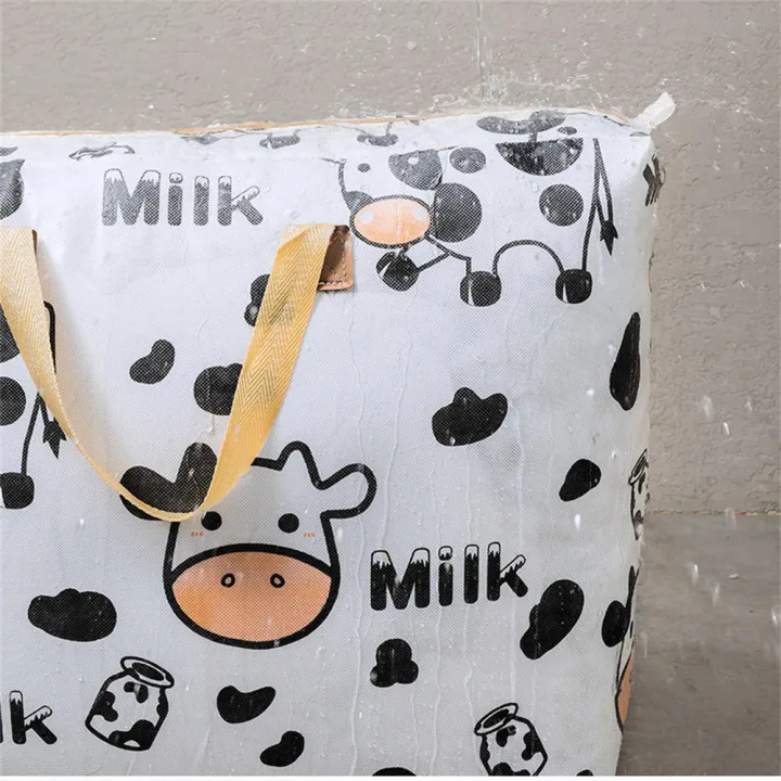 Foldable%20%20Quilt%20storage%20bag%20Neat%20Handbags%20Portable%20%20Dustproof%20wardrobe%20organizer%20bags%20Waterproof%20Dustproof%20%20Cartoon%20cow%20printing%20for%20Home%20organization%20%20Travel%20packing%20%20Kids'%20room%20%20College%20dorms%20-%20Image%204