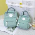Portable Solid Color Parent-Child Backpack Canvas Zipper Mommy Bag Adjustable School Bag Women. 