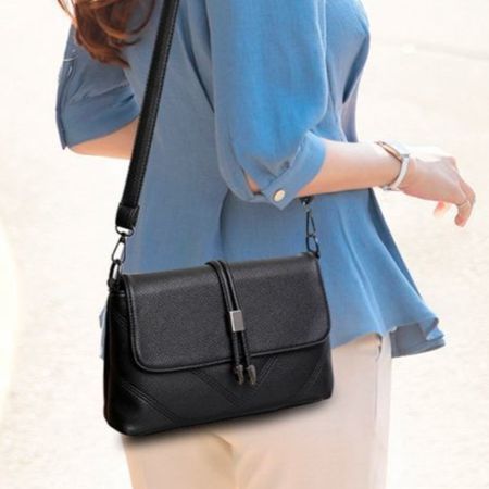 Ladies black messenger bag on sale