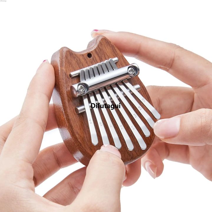 Difutagui%20Zheng%20Set%20Gift%20Portable%20Musical%20Instrument%20Drop%20Bag%20Thumb%20Kalimba%202025%20New%20Sales%20promotion%20Mini%208%20Key%20Piano%201%20Style%20Cute%20and%20Beautiful%20Kids%20-%20Image%209