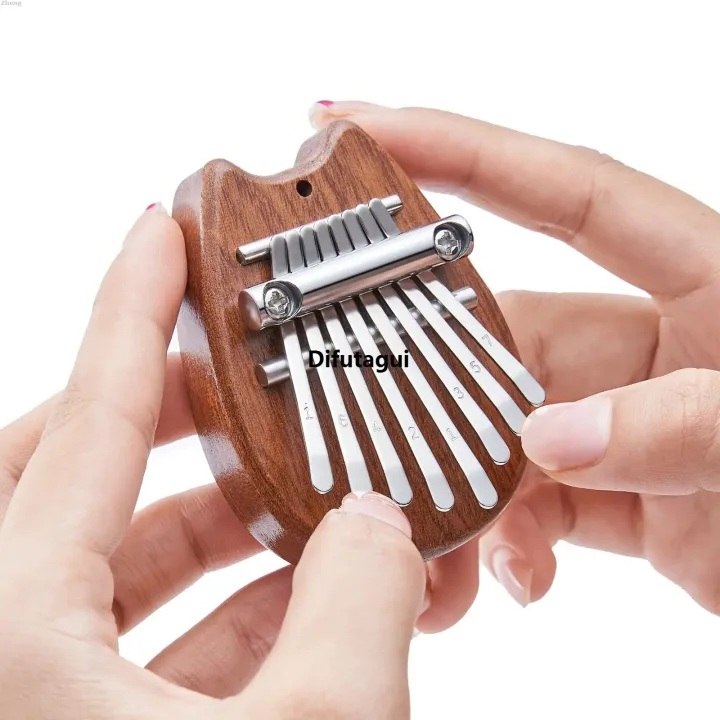 Difutagui%20Zheng%20Set%20Gift%20Portable%20Musical%20Instrument%20Drop%20Bag%20Thumb%20Kalimba%202025%20New%20Sales%20promotion%20Mini%208%20Key%20Piano%201%20Style%20Cute%20and%20Beautiful%20Kids%20-%20Image%209