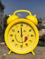 Yellow Colored Smile Table Alarm Clock. 