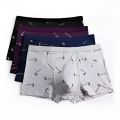 Pack Of 4 Men Boxer Cotton Underwear Shorts Briefs (Color / Print May Vary). 