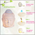 Salcko White Ceramic Buddha Aroma Diffuser With 2 Diffuser Oil Bottles And 2 Candles - Sandalwood. 