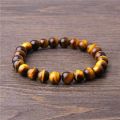 8 MM Tiger Eye Unisex Bracelet. 