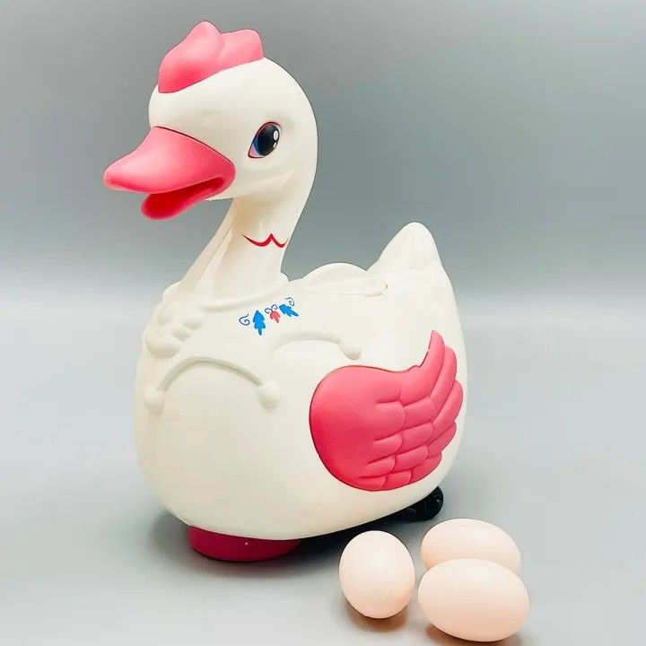 Electric%20Egg%20Laying%20Crawling%20Goose/Duck%20Toy%20With%20Lights%20And%20Music%20For%20Kids%20Multicolor%20-%20Image%202