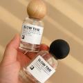 High-End Perfume Bottle Elegant Design 30ml 50ml Glass Spray Bottle Large Capacity Wooden Cap Replacement Bottle for. 