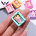 Miniature Baby Bed Cartoon Realistic Plastic Doll House Ornament Baby Doll Crib for Children. 