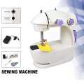 Mini Sewing Machine. 