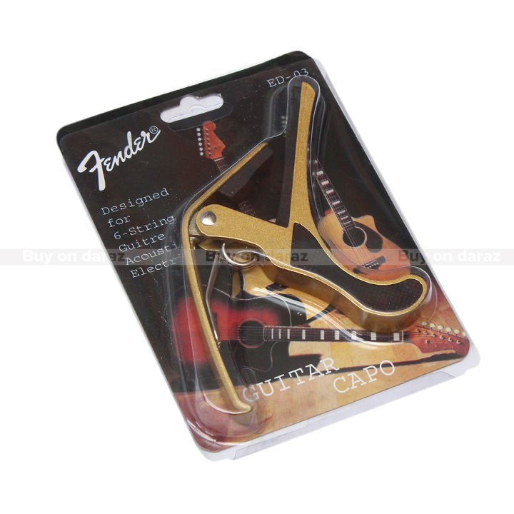 Fender%20Golden%20Metal%20Capo%20For%20Guitar%20%7C%20Alloy%20Material%20Strong%20&%20Durable%20Golden%20Capo%20For%20All%20Guitars%20%7C%20Golden%20Guitar%20Capo%20-%20Image%204