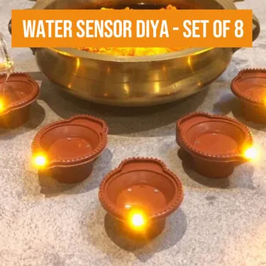 Water%20Sensor%20Magic%20Diya%20-%20Set%20of%208%20-%20LED%20Lights%20Electric%20Diya%20For%20Decorations%20%7C%20Golden%20Colored%20Lights%20%7C%20-%20Image%202