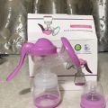 Manual Breast Pump with 150ml Feeding Bottle – Powerful Nipple Suction Milk Extractor for Easy Lactation. 