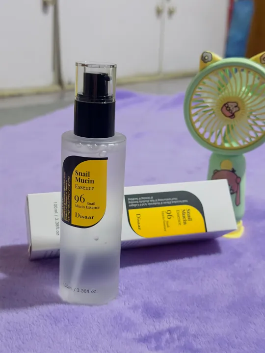 "Disaar%20Snail%20Mucin%20Essence%20Serum%20100ml:%20A%20Powerful%20Skincare%20Solution%20for%20Radiant%20and%20Healthy%20Skin"%20with%20small%20potable%20mini%20fan%20gift%20-%20Image%203