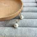 Cream White Color Bead Hook Earrings for Women by Treasure Box Nepal. 